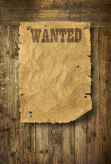Obraz premium Wild West wanted poster on old wooden wall