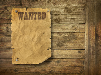 Wild West wanted poster on old wooden wall - obrazy, fototapety, plakaty