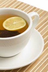 Tea cup with lemon