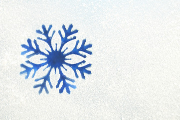 Snowflake on a frozen window