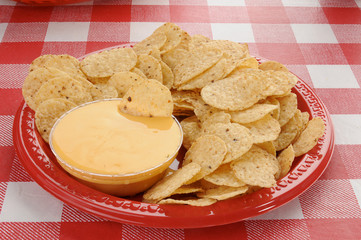 Tortilla chips and cheese sauce
