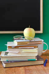 school chalkboard and books