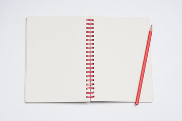 notebook red pencil