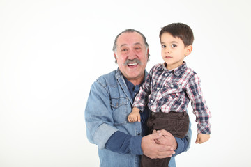 Child and grandfather playing