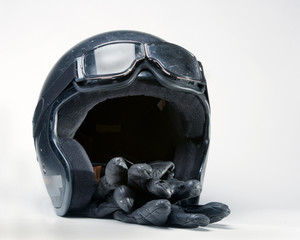 Old motorcycle helmet, gloves and gloves.