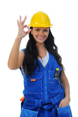 Beautiful young woman doing repairs