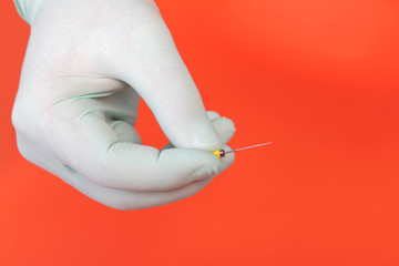 Dentist hand with  drill for nerve removal