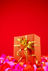 Present in a red box against red background