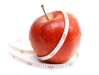 Red fresh apple with tape on white background