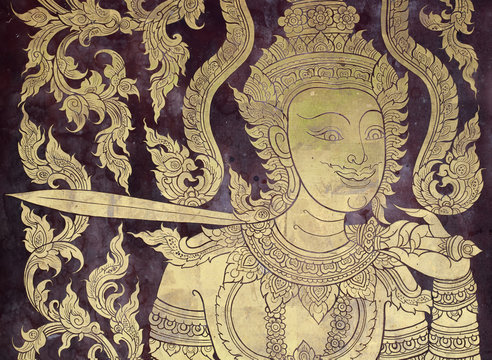 Ancien golden angel picture on the door in Thai temple.