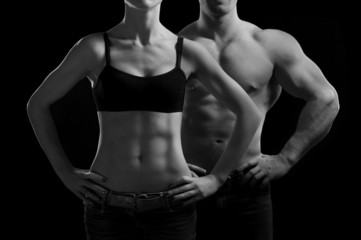 Fototapeta na wymiar Mężczyzna i kobieta na siłowni