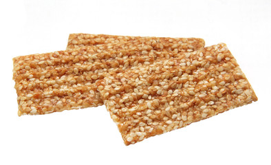 Kozinaki of sesame on a white background