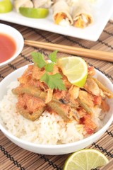 Thai red chicken curry with spring rolls