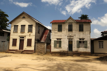 Fototapeta na wymiar Old wooden houses in the JF Nassylaan in Paramaribo