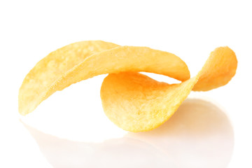 Delicious potato chips isolated on white