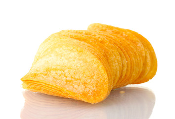 Delicious potato chips isolated on white