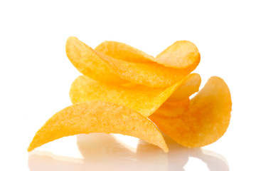 Fototapeta na wymiar Delicious potato chips isolated on white