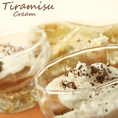 tiramisu in a glass with coffee beans