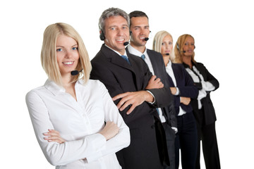 Beautiful executive wearing headsets