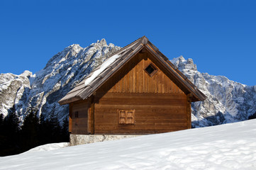 Mountain chalet in winter - Italy Alps