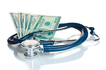 Stethoscope and American money isolated on white