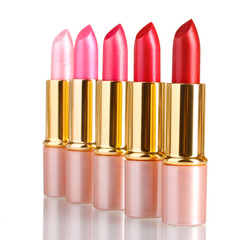 beautiful lipsticks isolated on white