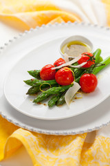 green asparagus with roasted tomatoes