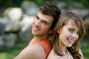Fototapeta premium Portrait of smiling young couple
