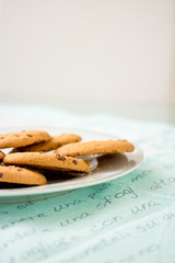 Fototapeta na wymiar chocolate chip cookies on blue table set