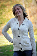 Woman in Sweater Standing Outside