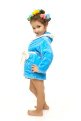 beautiful little girl with a comb in hair curlers