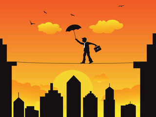 businessman walking a high wire tightrope