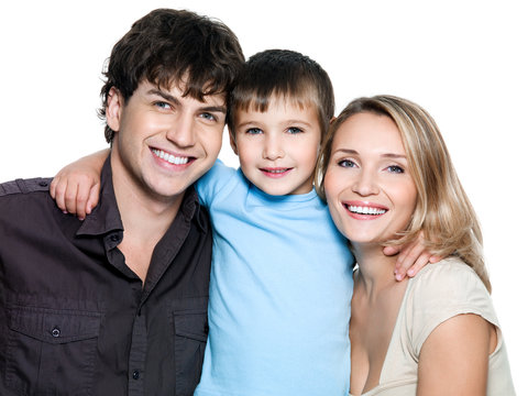 Happy young smiling family with son