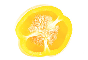 Yellow paprika (pepper) sliced isolated on a white background
