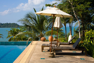 Swimming pool by the sea in Thailand