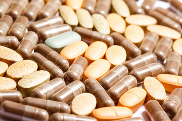 Medicinal pills piled up a bunch