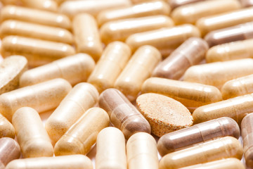 Medicinal pills piled up a bunch