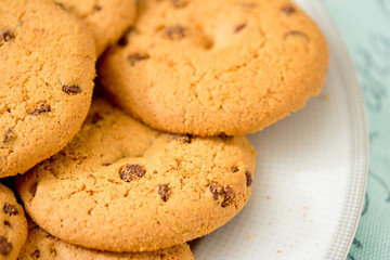 chocolate chip cookies on blue table set