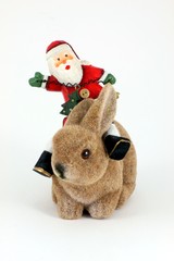 Weihnachtsmann reitet auf Osterhasen Deco