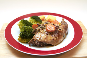 Braised rabbit with potatoes and broccoli