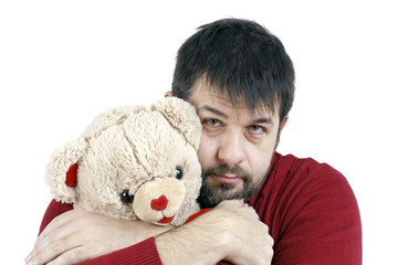 Guy hugging teddy bear