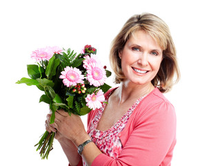 Happy senior woman with flowers.