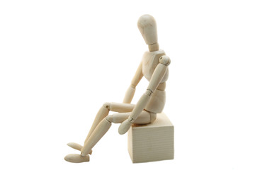 Wooden Manikin Doll Sitting On Box