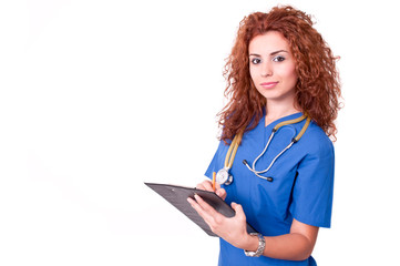 Female doctor holding clipboard and smiling