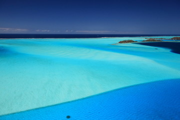 Bora Bora Lagoon, French Polynesia from above. Dreamlike colors.