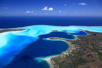 Bora Bora Lagoon, Motus and Main Island in French Polynesia from above. Dreamlike colors.
