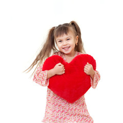 Cute happy kid with red heart in motion