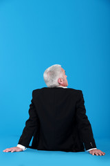 Read view of a businessman looking up