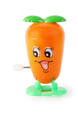 funny toy clockwork orange carrot with face on white