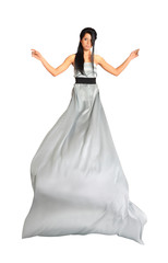 Fototapeta na wymiar beautiful girl wearing long silver dress isolated on white